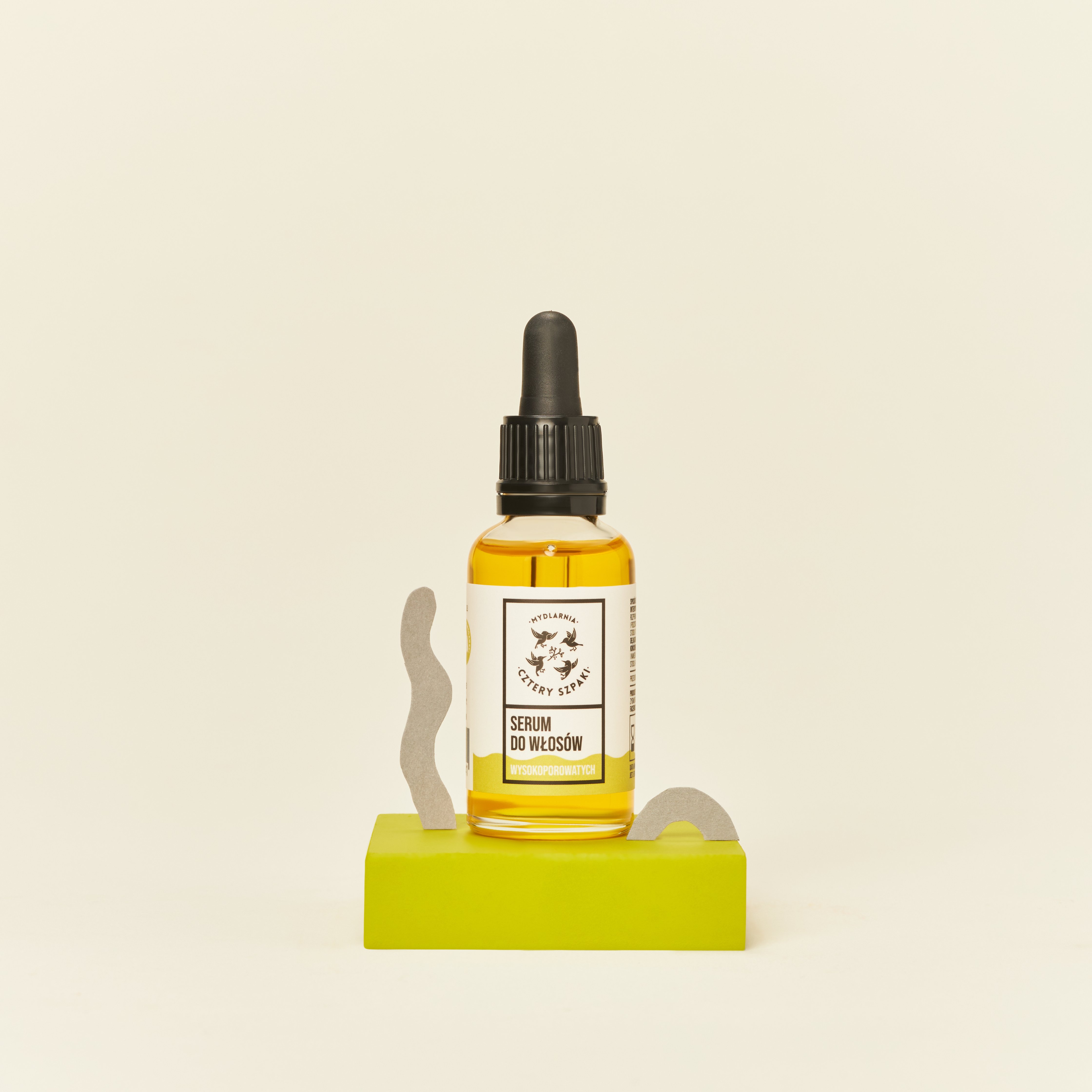 Serum do włosów wysokoporowatych w szklanej butelce z pipetą