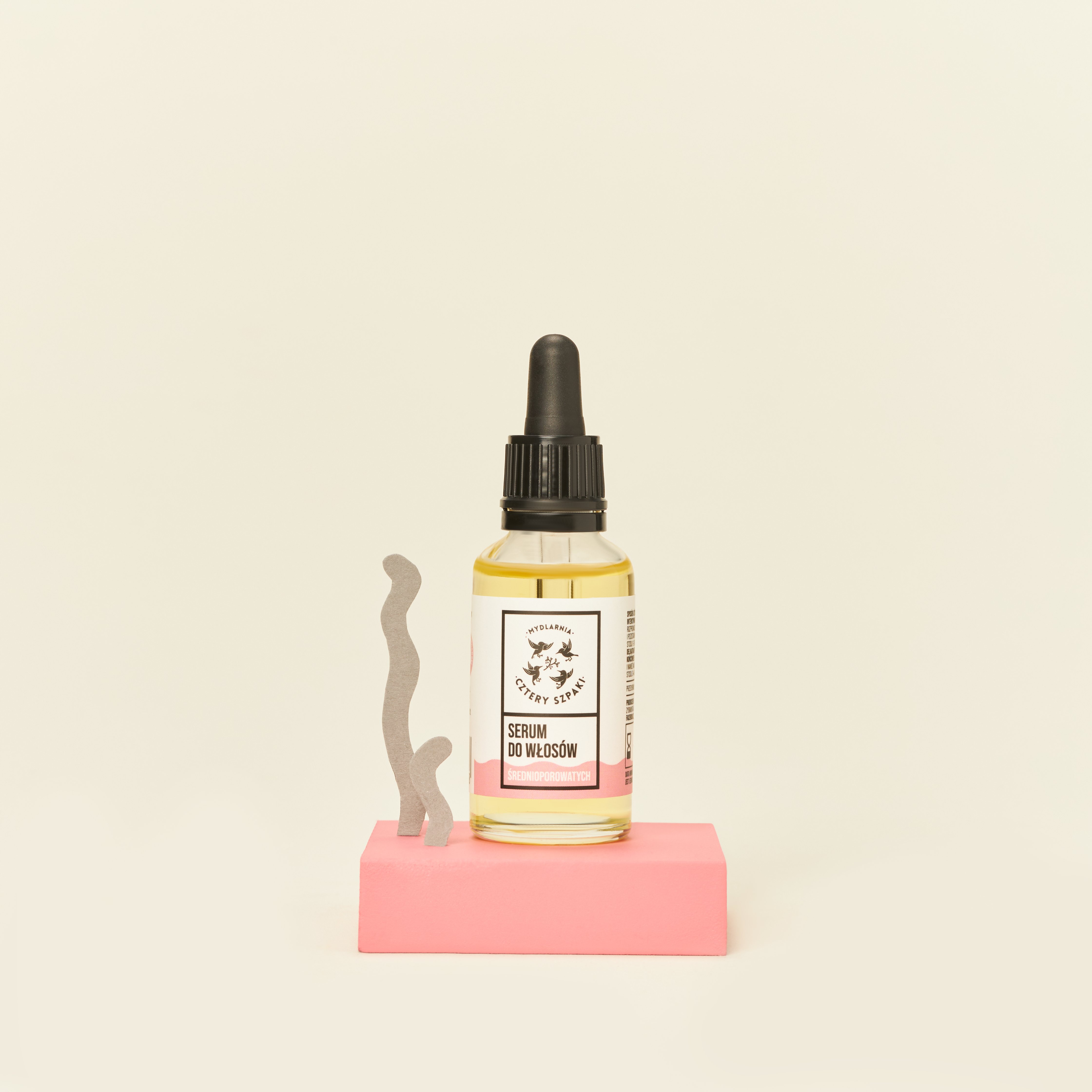 Serum do włosów średnioporowatych w szklanej butelce z pipetą