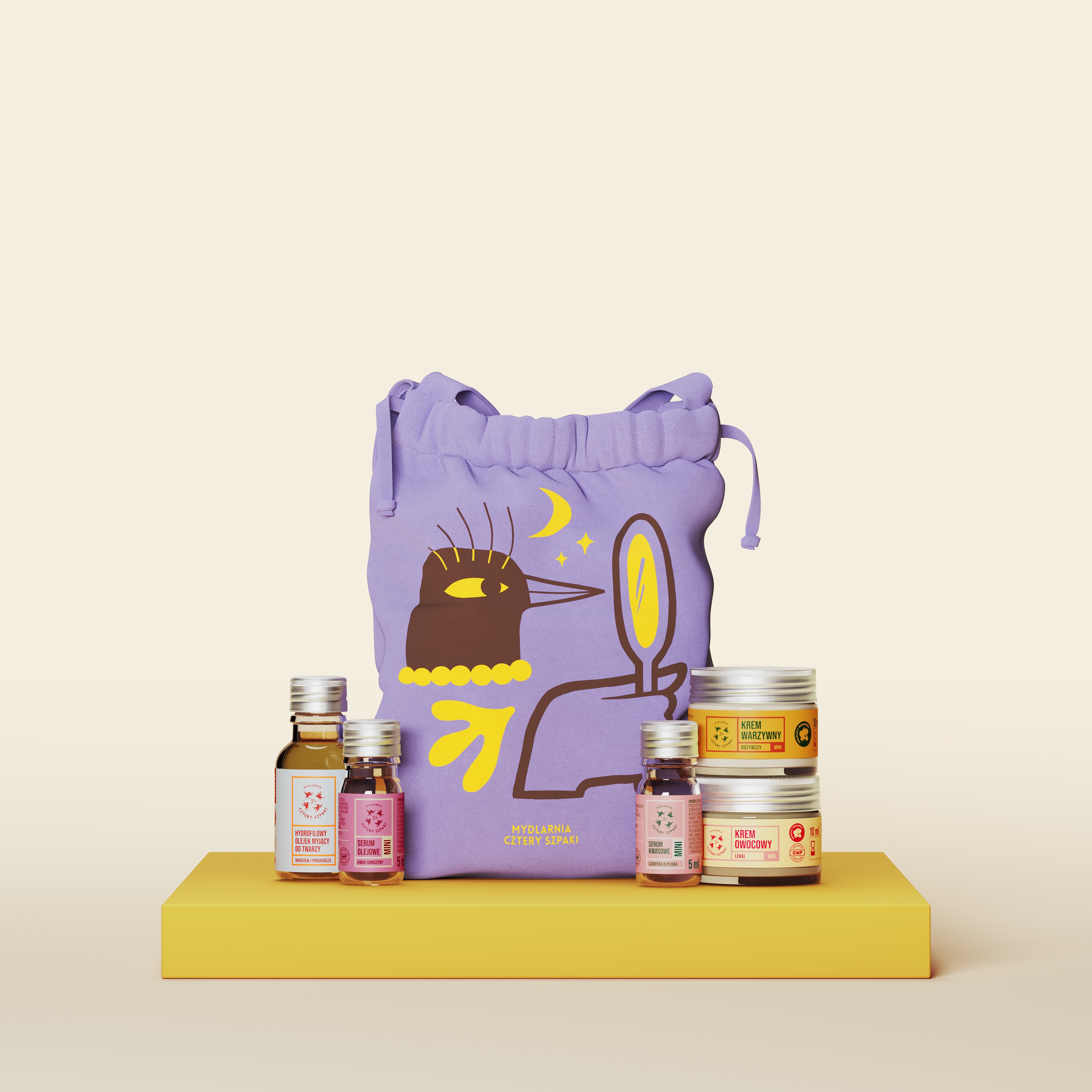 Zestaw mini kosmetyków naturalnych z fioletowym woreczkiem z nadrukiem ptaka z lusterkiem